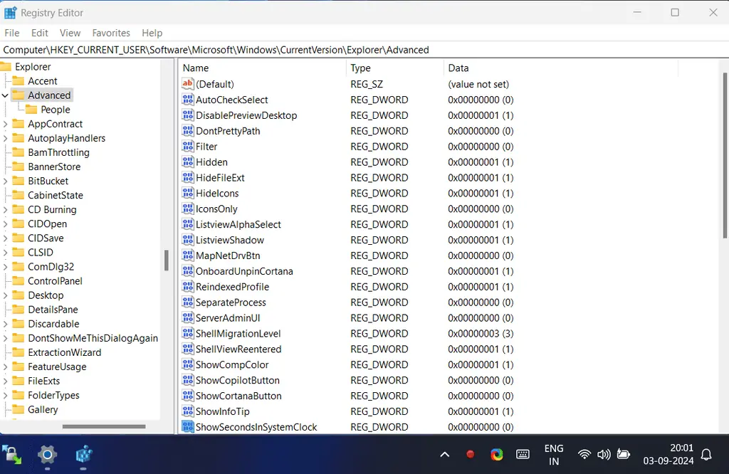Modifying Registry File DWORD 32-bit Value to 1 displays seconds in system tray clock.