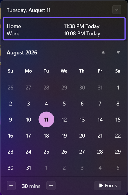 Windows 11 taskbar calendar with Home and Work additional clocks outlined in purple