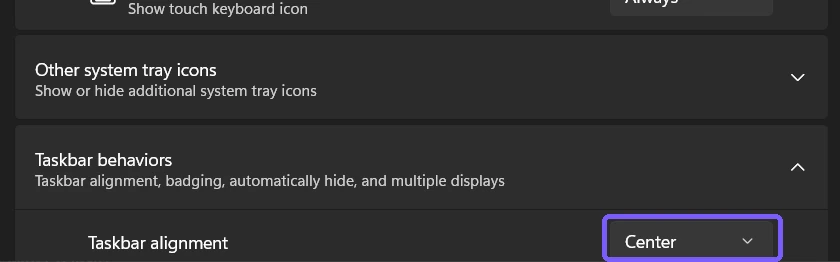Fresh Windows 11 Settings window showing Taskbar alignment restored to Center and outlined in purple