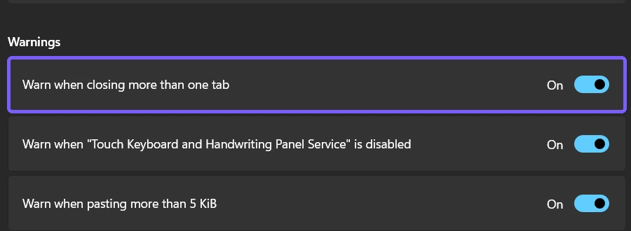 Fresh Windows Terminal Settings showing the multi-tab close warning restored On and outlined in purple