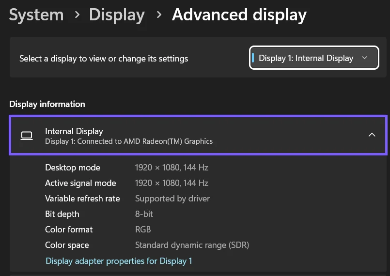 Windows 11 Advanced display page with the Connected to AMD Radeon Graphics line outlined in purple