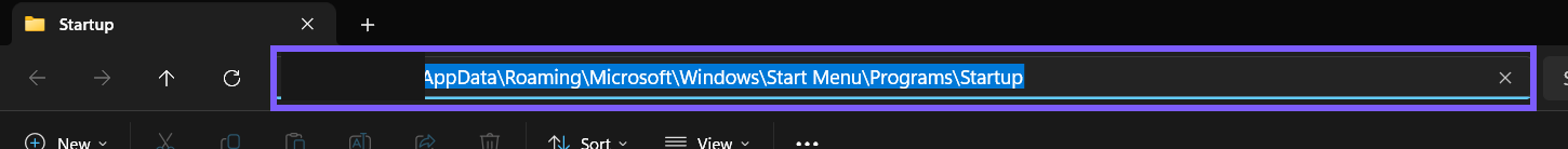 Current-user Startup folder AppData path outlined in purple with the private profile name redacted